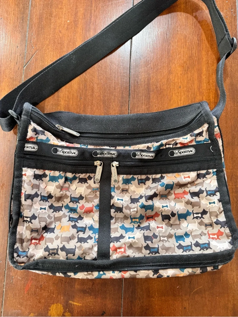 LeSportsac Multi-Dog Print Crossbody in Beige, Blue, Black & Red Accents